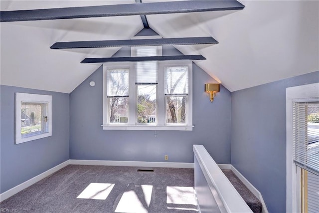 bonus room featuring lofted ceiling with beams, visible vents, and carpet floors