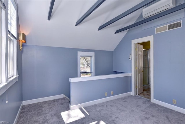 additional living space with lofted ceiling with beams, visible vents, baseboards, and carpet flooring