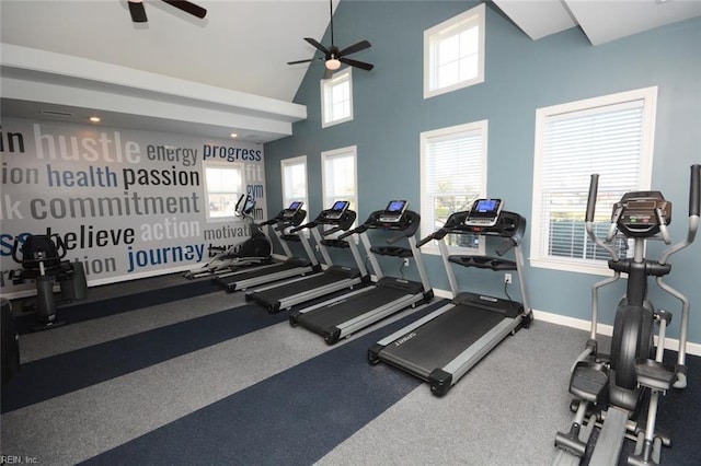 exercise room featuring high vaulted ceiling, baseboards, and ceiling fan