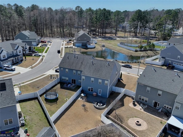 bird's eye view with a residential view and a water view