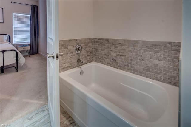 bathroom featuring a garden tub