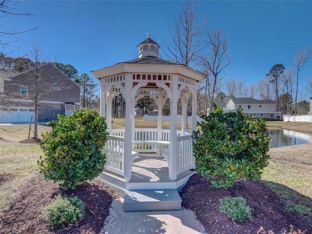 view of community featuring a gazebo and a water view