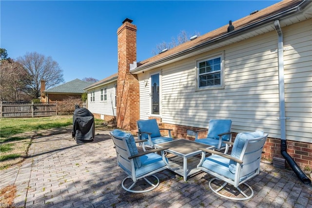 deck with a patio and fence