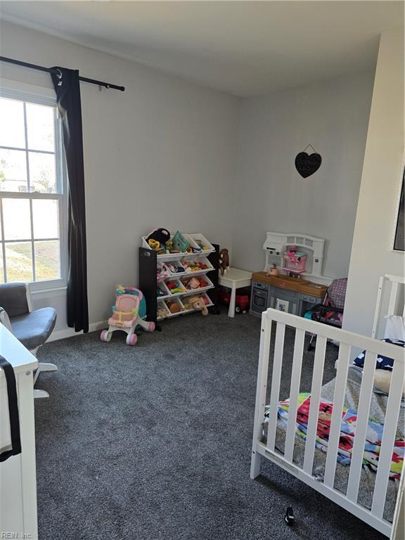 bedroom featuring carpet flooring