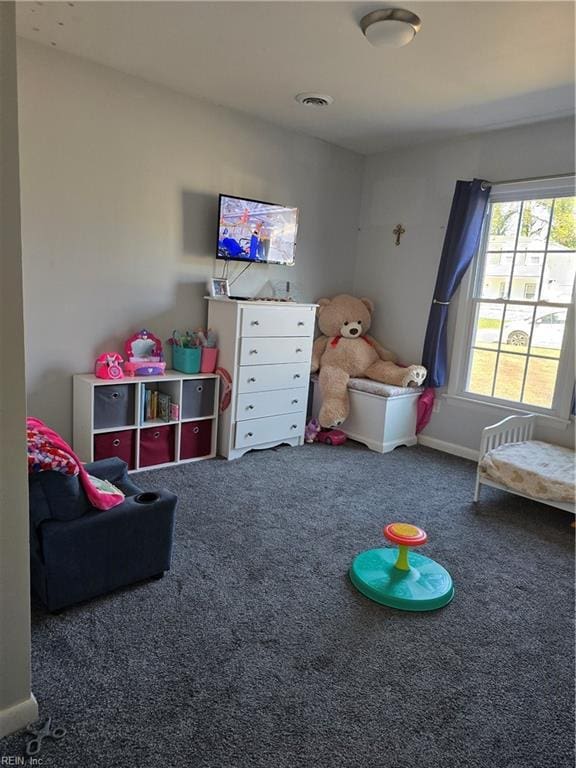 playroom with visible vents, carpet floors, and baseboards