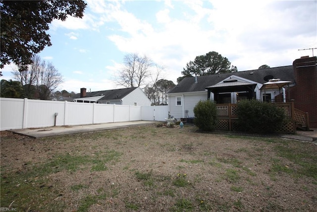 view of yard with a patio area, a gazebo, and fence