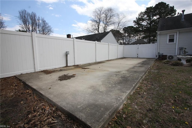 view of patio / terrace featuring a gate and fence