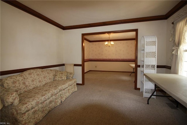 living room featuring a notable chandelier, carpet flooring, wallpapered walls, and ornamental molding