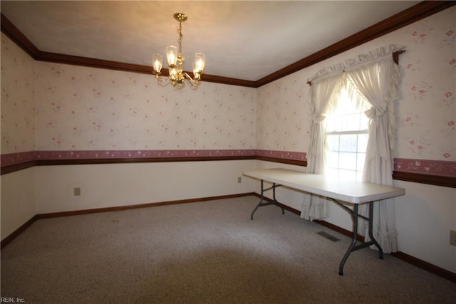 unfurnished dining area with visible vents, wallpapered walls, crown molding, baseboards, and carpet