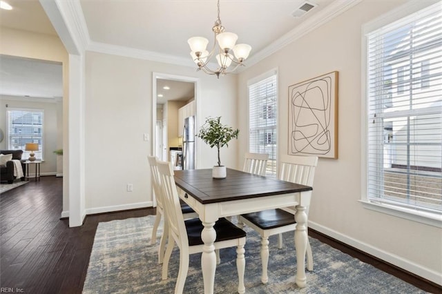 dining area featuring a wealth of natural light, visible vents, dark wood-type flooring, and baseboards