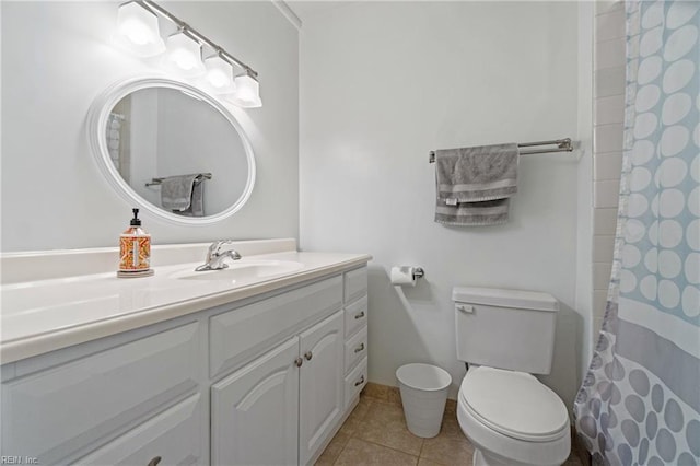 full bath with tile patterned flooring, toilet, curtained shower, and vanity