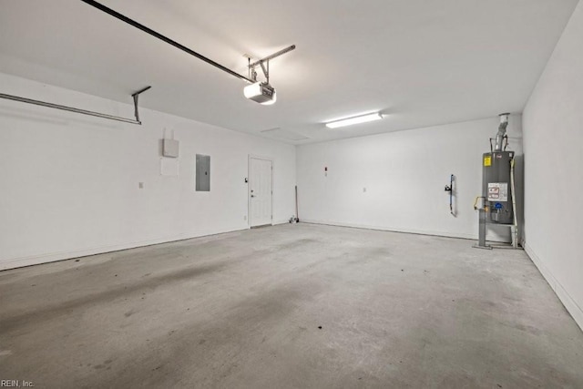 garage featuring electric panel, a garage door opener, and water heater