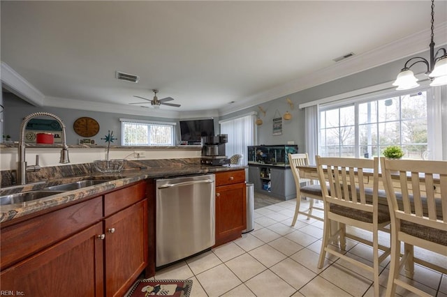 kitchen featuring visible vents, ornamental molding, a sink, and stainless steel dishwasher