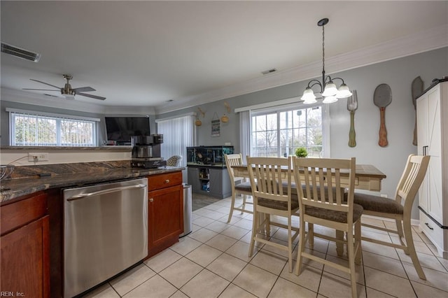 kitchen with visible vents, a healthy amount of sunlight, ornamental molding, and stainless steel dishwasher