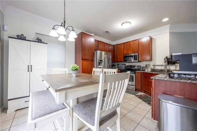 kitchen featuring light tile patterned floors, stainless steel appliances, an inviting chandelier, and visible vents