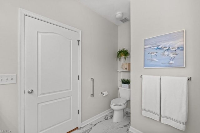 bathroom with visible vents, toilet, baseboards, and marble finish floor