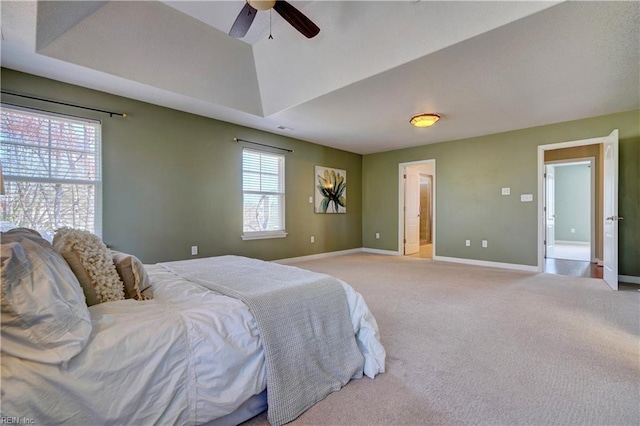 carpeted bedroom with baseboards