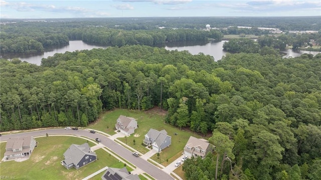 bird's eye view featuring a water view and a wooded view