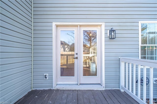 doorway to property with a deck