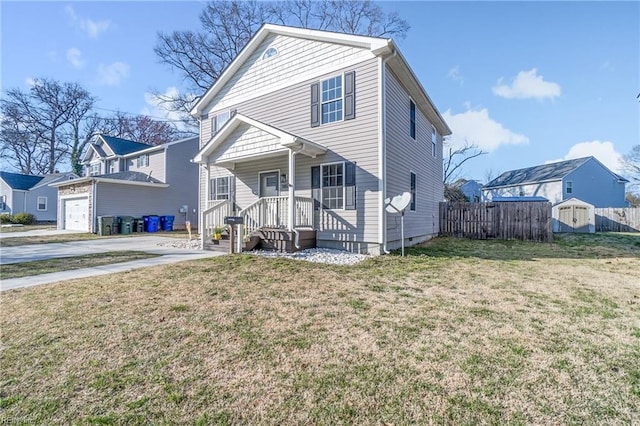 traditional-style home featuring a storage unit, fence, covered porch, an outdoor structure, and a front yard