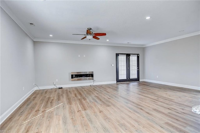 unfurnished living room with light wood finished floors, recessed lighting, baseboards, and ornamental molding