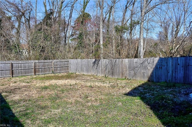 view of yard featuring a fenced backyard