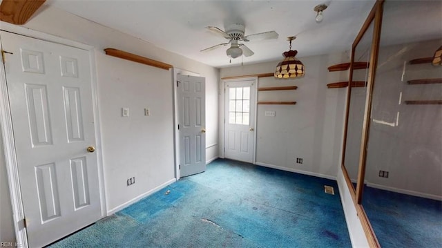 unfurnished bedroom featuring carpet flooring and baseboards