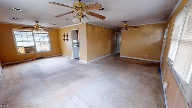 unfurnished room featuring cooling unit, crown molding, a ceiling fan, and carpet floors