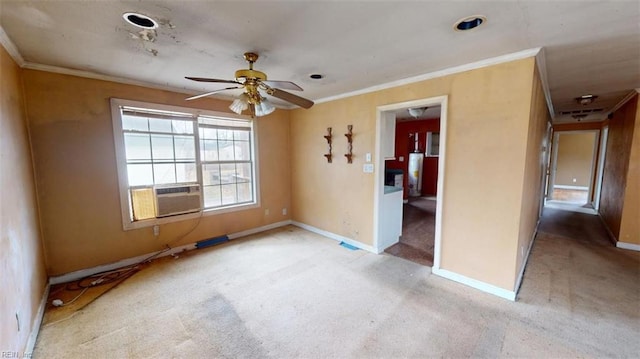 carpeted spare room featuring ceiling fan, cooling unit, baseboards, and ornamental molding