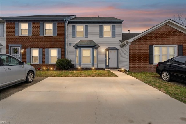 multi unit property featuring brick siding