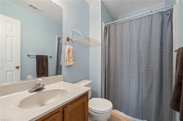 bathroom with tile patterned flooring, visible vents, toilet, a shower with shower curtain, and vanity