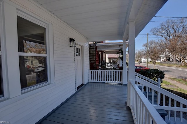 wooden deck with a porch