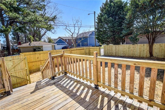 deck with a fenced backyard