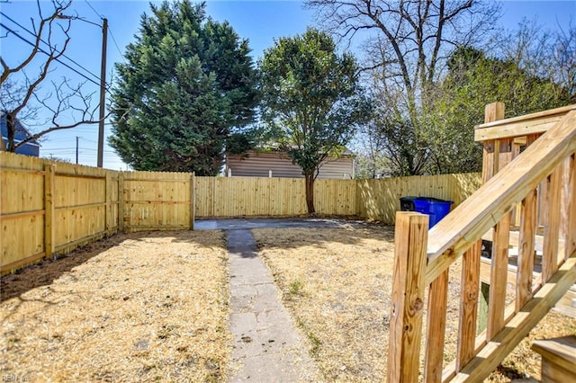 view of yard featuring a fenced backyard