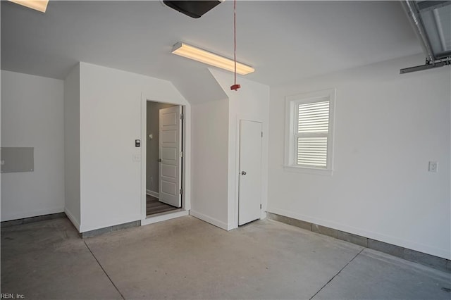 garage with baseboards