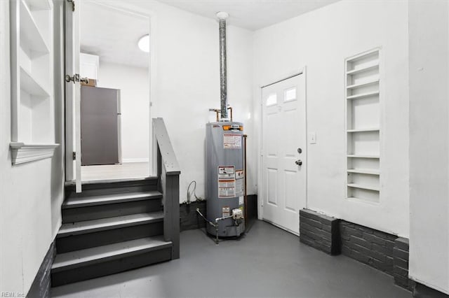 utility room with water heater