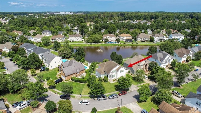 aerial view featuring a residential view and a water view