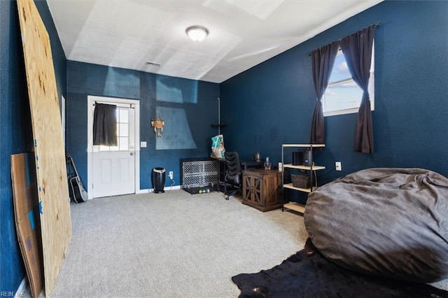 bedroom with carpet flooring, visible vents, and baseboards