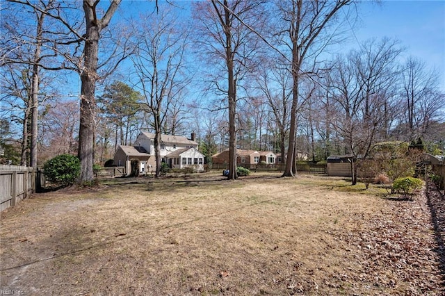 view of yard featuring fence