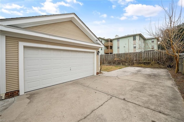 garage featuring fence