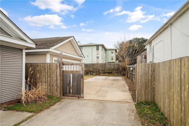 view of patio / terrace featuring a residential view and a fenced backyard