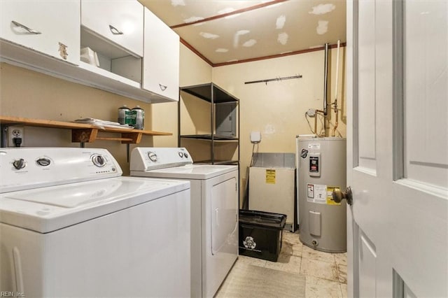 clothes washing area with separate washer and dryer, crown molding, cabinet space, and electric water heater