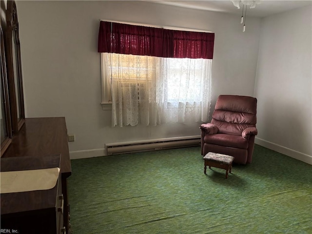 living area with a baseboard radiator, baseboards, and carpet flooring