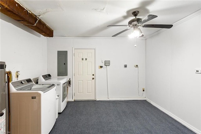 clothes washing area with washing machine and dryer, electric panel, laundry area, a ceiling fan, and dark colored carpet