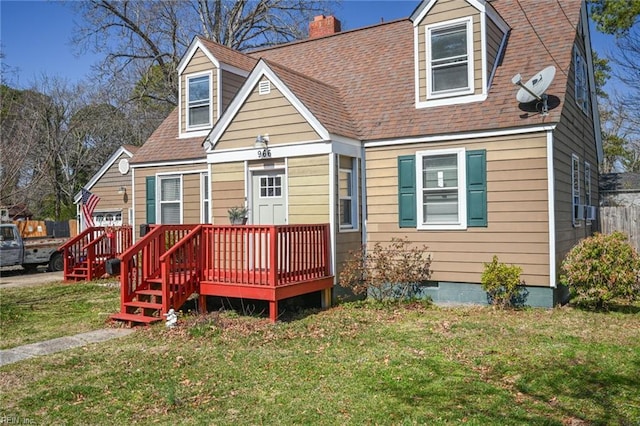 view of front of house with crawl space, a wooden deck, a front yard, and a shingled roof