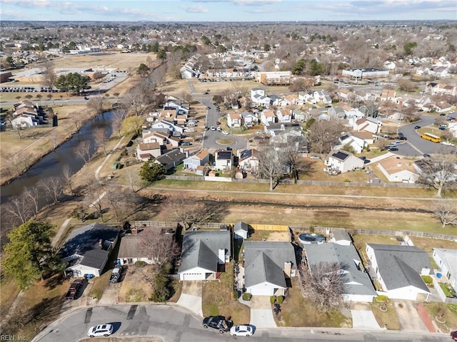 aerial view featuring a residential view and a water view