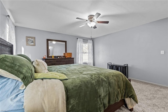 bedroom featuring baseboards, carpet floors, and ceiling fan