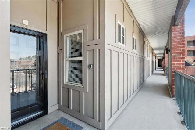 view of exterior entry featuring stucco siding