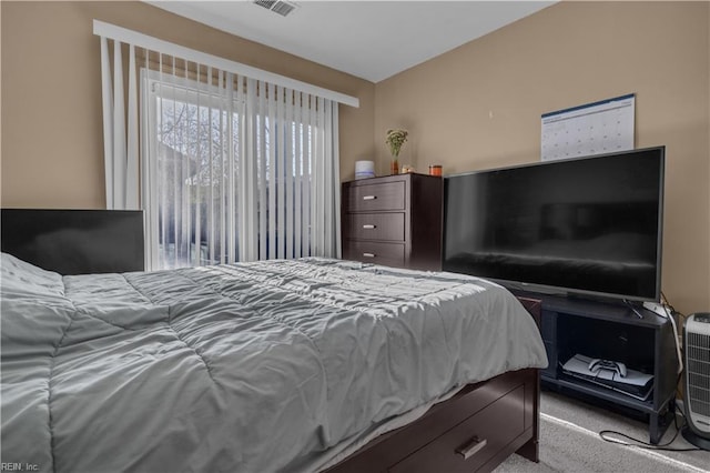 bedroom featuring visible vents and carpet floors