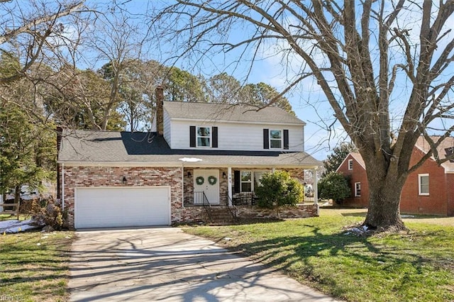 traditional-style home with concrete driveway, a front yard, a garage, brick siding, and a chimney